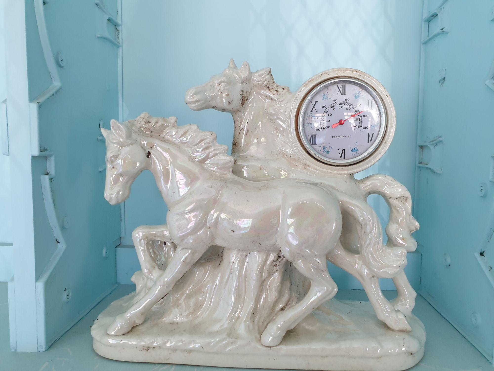 Ceramic horse figurine with a circular thermometer (working)