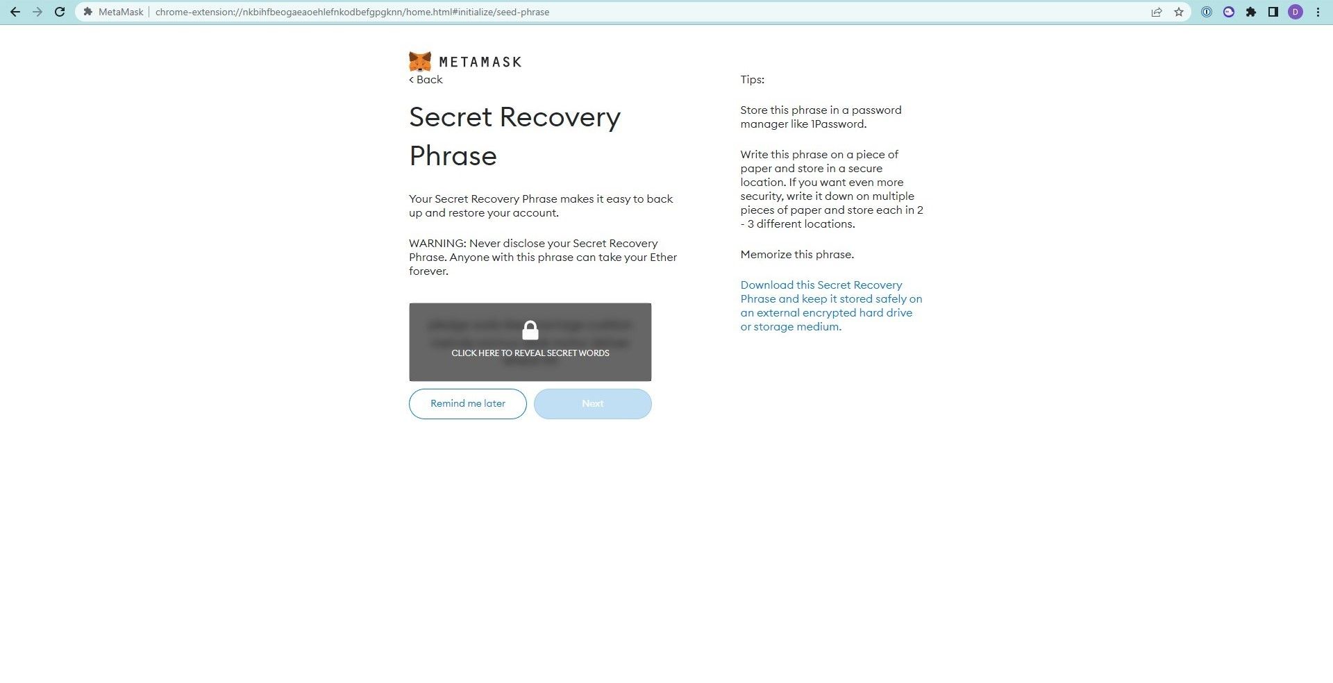 Screenshot of Metamask showing a 12-word phrase hidden until it is clicked